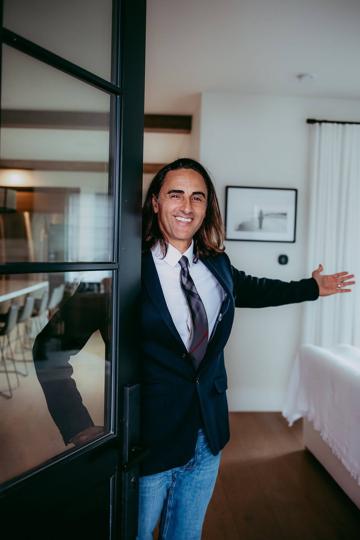 Bobby Kashani welcomes visitors to an Olive Avenue home