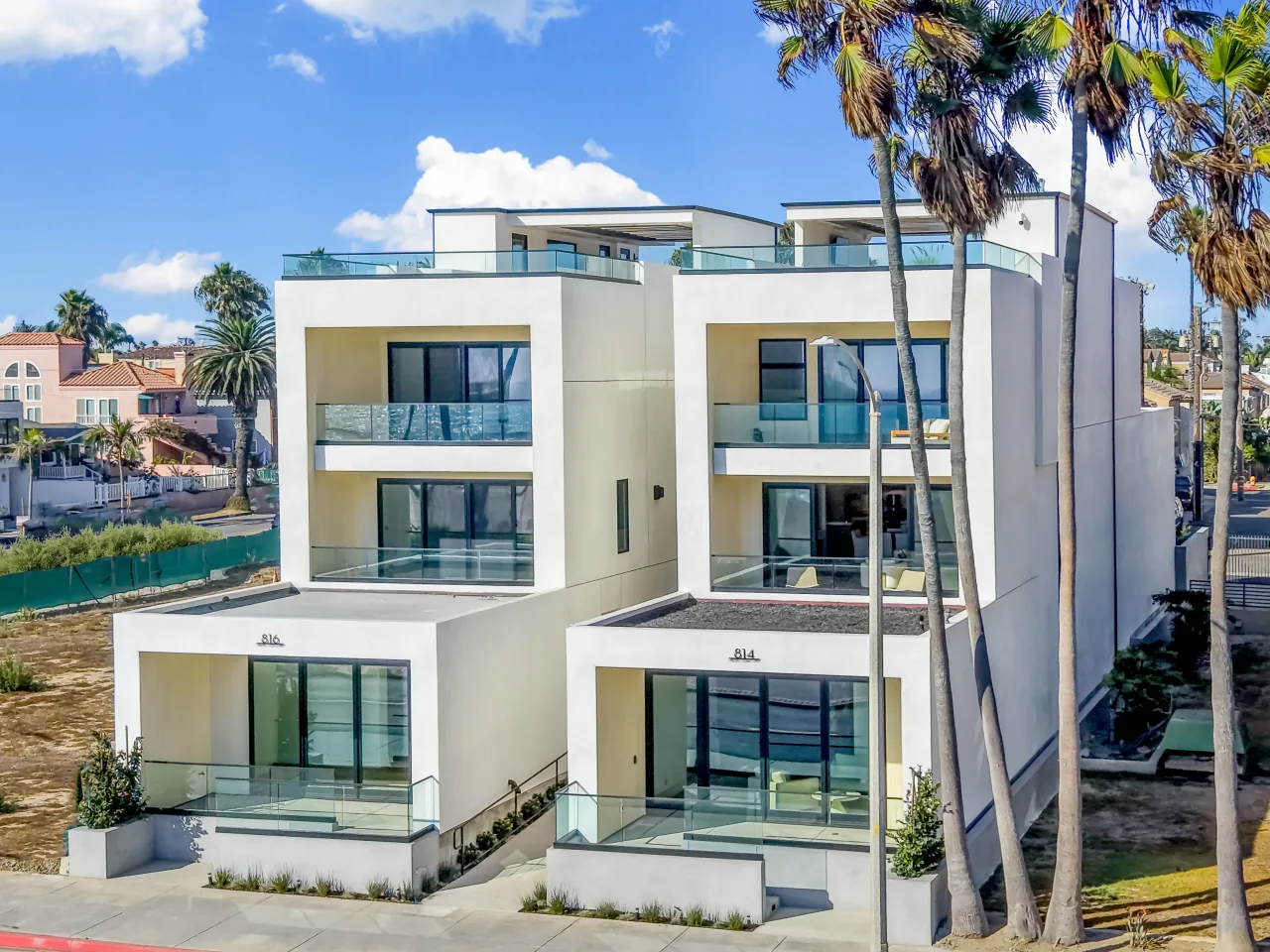 Street-facing view of the neighboring 814 and 816 PCH homes