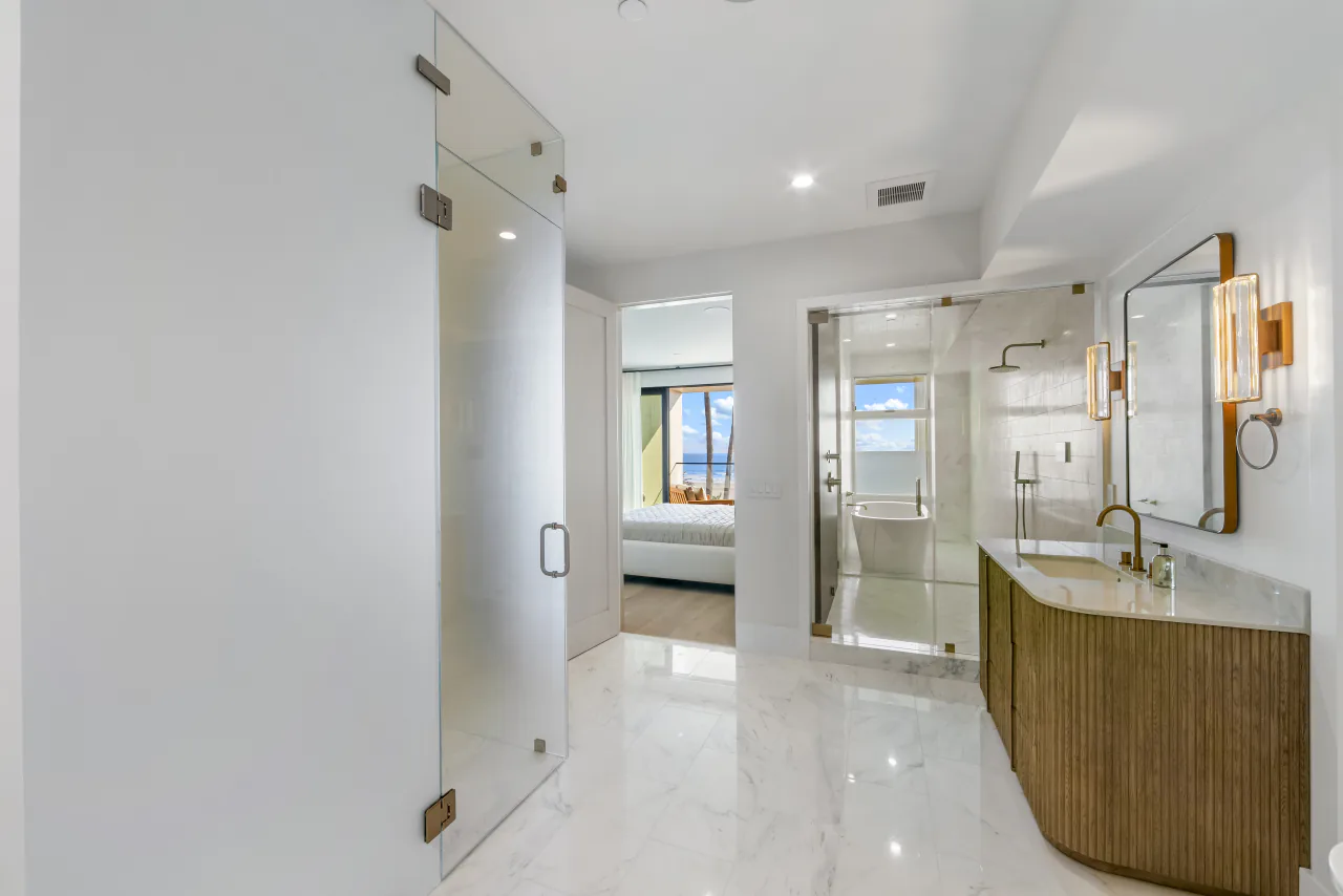 Bathroom vanity and glass shower