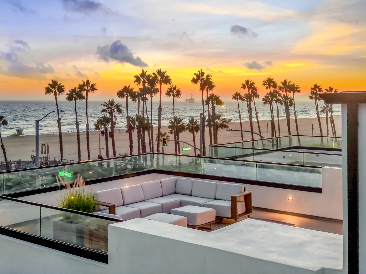 Sunset over the ocean from the rooftop terrace